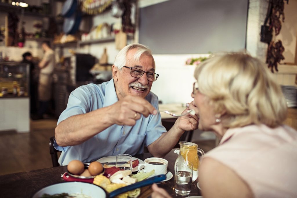 A older couple go green as they travel