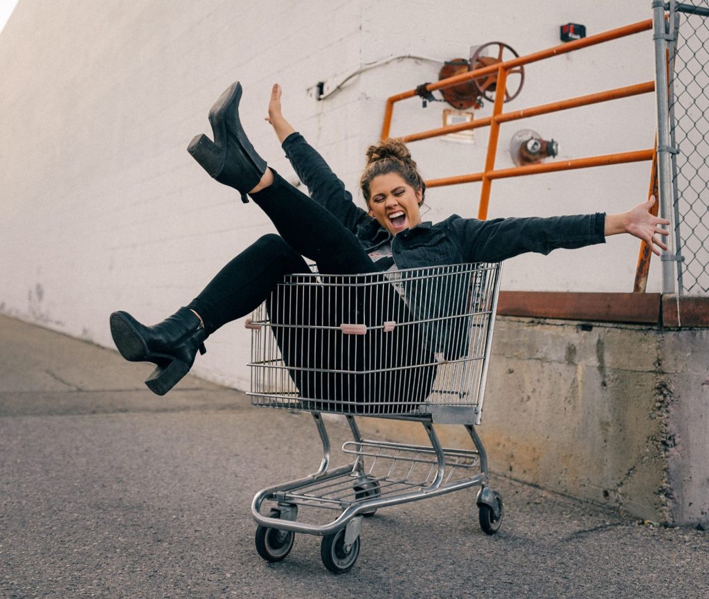 woman in shopping cart