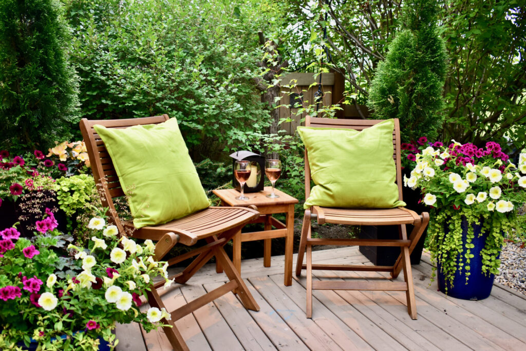 outdoor garden patio oasis for afternoon backyard relaxation and glass of wine on warm seasonal summer days