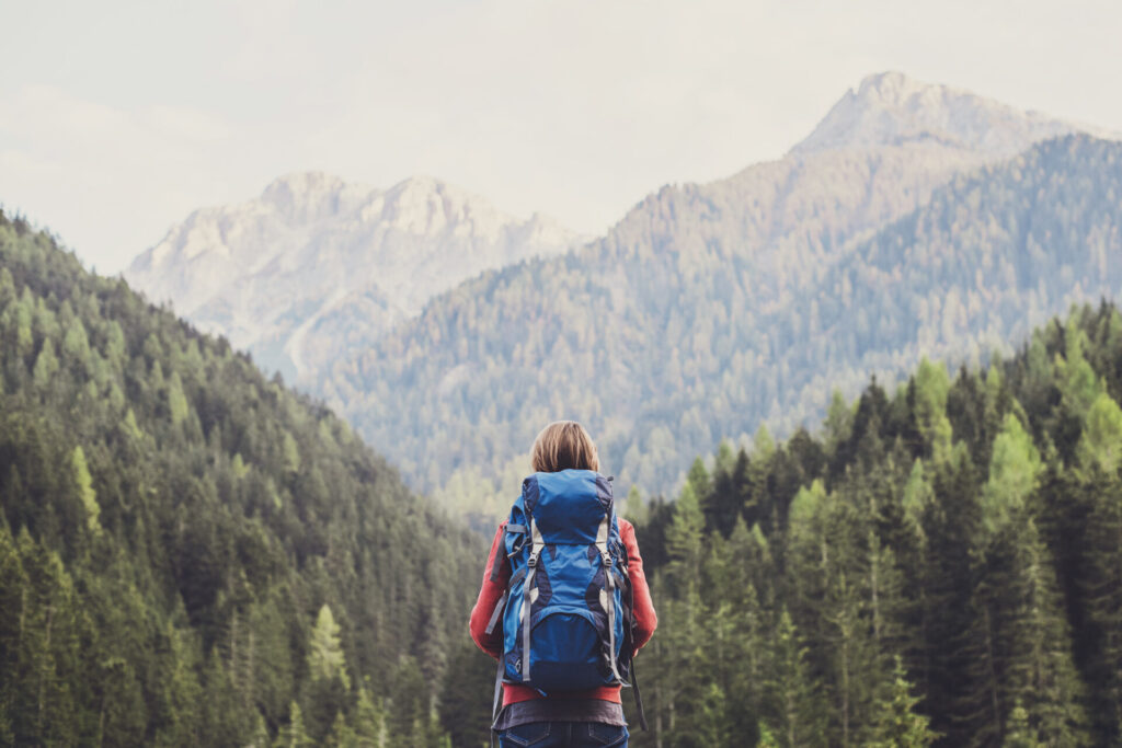 Young woman traveler in a mountains