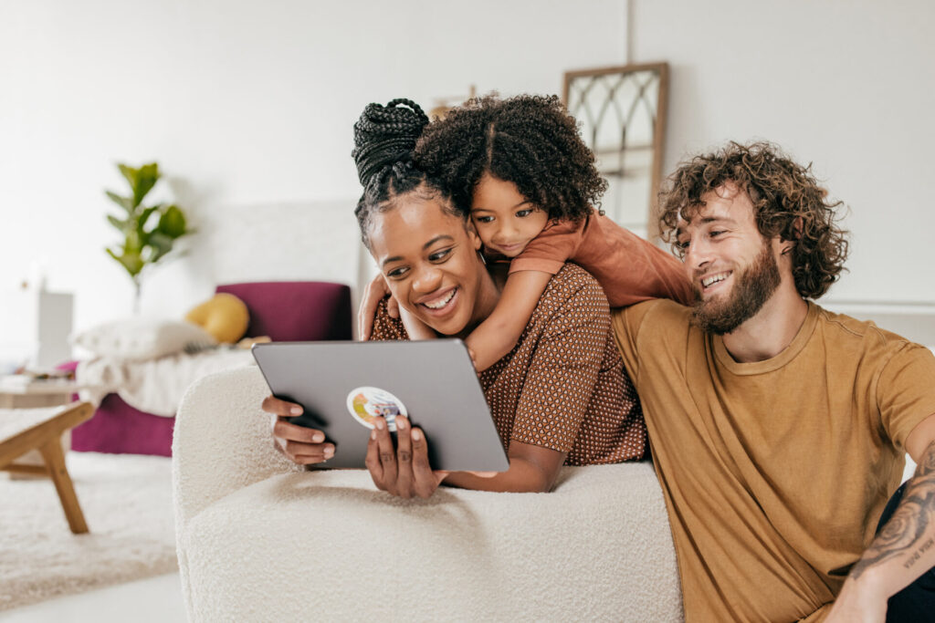 family looking at tablet