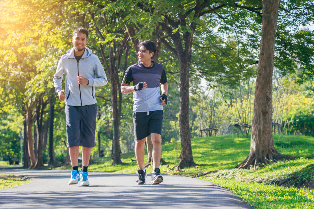 Two young men running