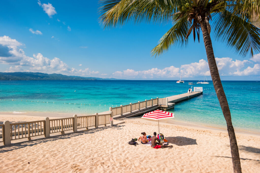 Family at Doctor's Cave Beach in Montego Bay Jamaica