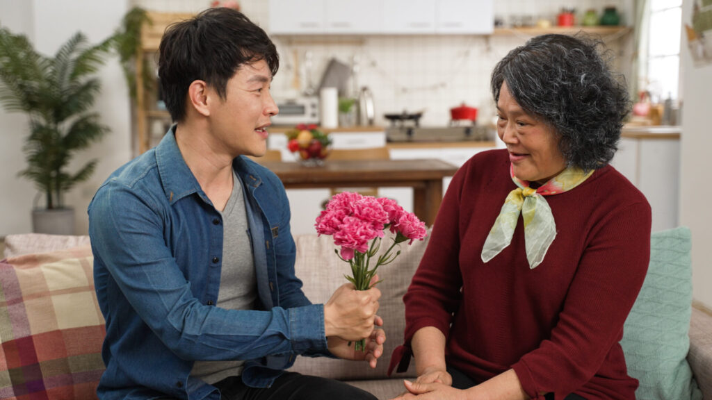 sun giving flowers to mother