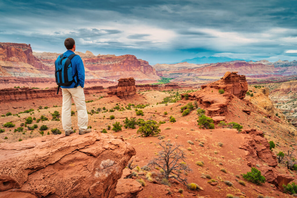 Hiker Capitol Reef National Park Utah USA Sunset Point